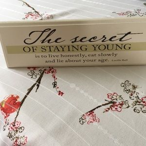The Secret of Staying Young Sign